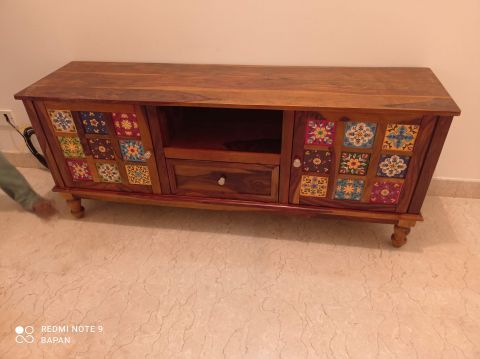 wooden storage unit with multiple drawers